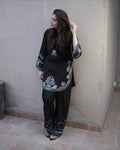 Premium Dhanak Embroidered Shirt Trouser by zairahofficial. Discover stylish Winter Dresses in Pakistan with elegant embroidery and premium designs.